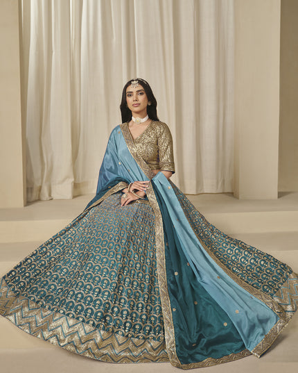 Bewitching Teal Blue Heavy Embroidered Premium Chinnon Silk Lehenga Choli Set