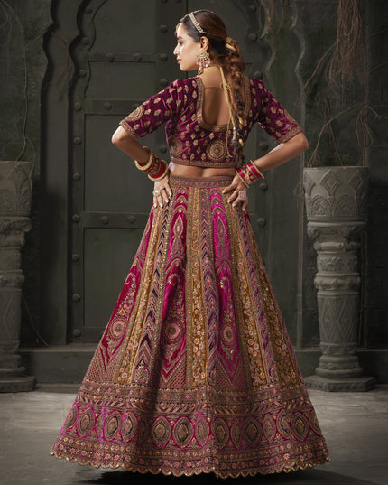 Rani Pink and Musterd Velvet Hand Embroidered Bridal Lehenga Choli