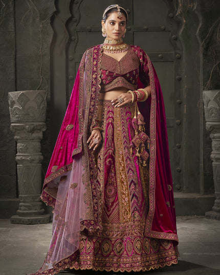 Rani Pink and Musterd Velvet Hand Embroidered Bridal Lehenga Choli
