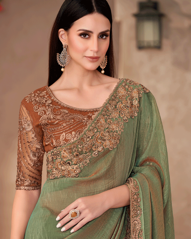 Impeccable Sauf Green Georgette Heavy Designer Saree