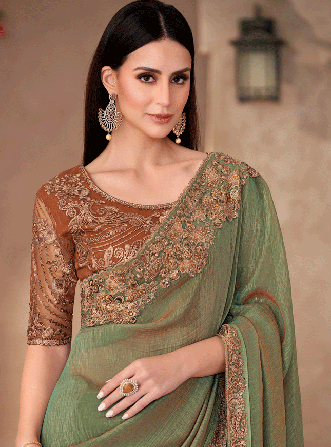 Impeccable Sauf Green Georgette Heavy Designer Saree