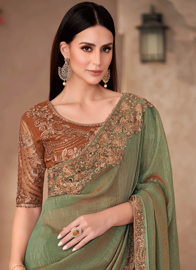 Impeccable Sauf Green Georgette Heavy Designer Saree