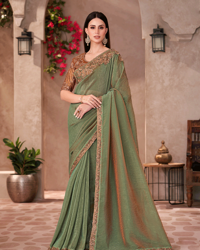 Impeccable Sauf Green Georgette Heavy Designer Saree