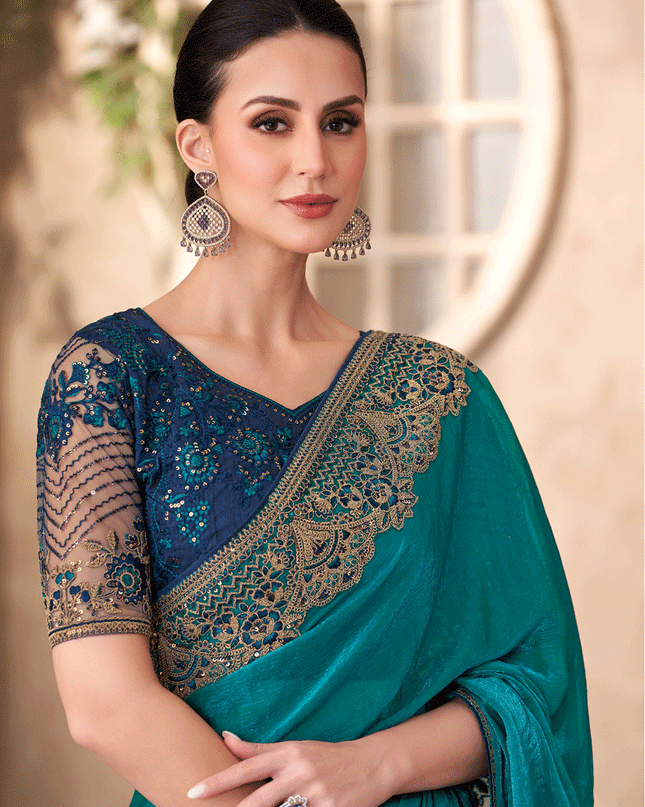 Graceful Peacock Blue Satin Georgette Heavy Designer Saree