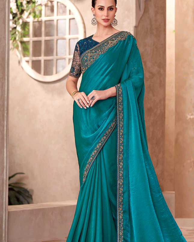 Graceful Peacock Blue Satin Georgette Heavy Designer Saree