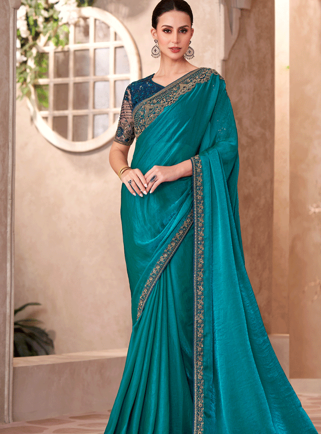 Graceful Peacock Blue Satin Georgette Heavy Designer Saree