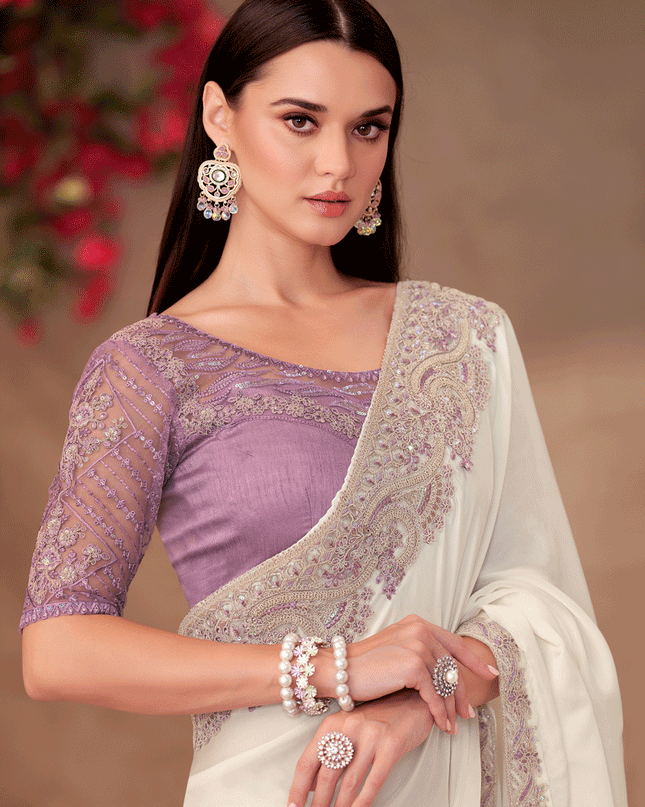 Dashing Pearl White Shining Georgette Heavy Designer Saree