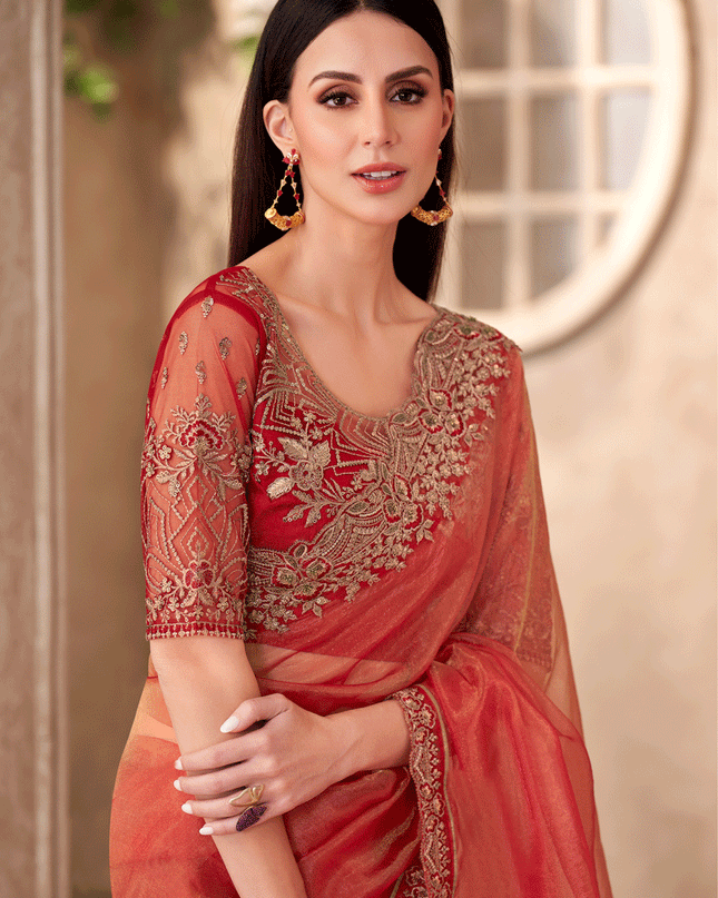 Immaculate Orange Tissue Heavy Designer Saree