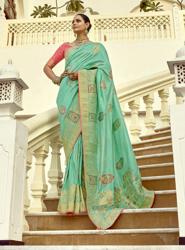 Charismatic Turquoise Dola Silk Handwork Wedding Saree