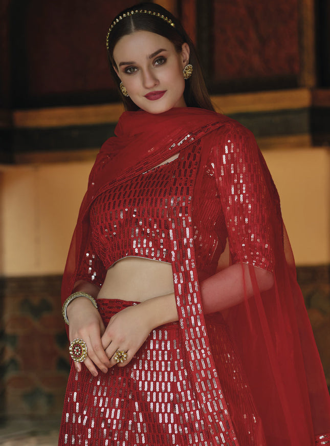 Trendsetting Rust Red Net Sequins Designer Lehenga Choli