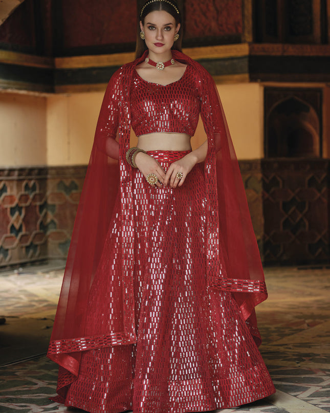 Trendsetting Rust Red Net Sequins Designer Lehenga Choli