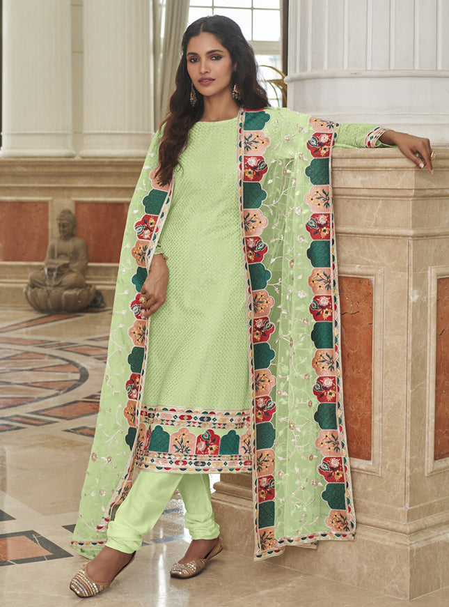 Trendsetting Pistachio Green Georgette Embroidered Churidar Kameez