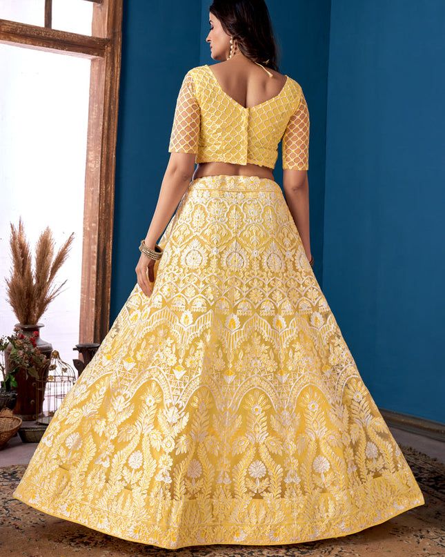 Lemon Yellow Net Embroidered  Wedding Wear Lehenga Choli