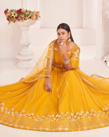 Golden Yellow Net Embroidered Lehenga Choli