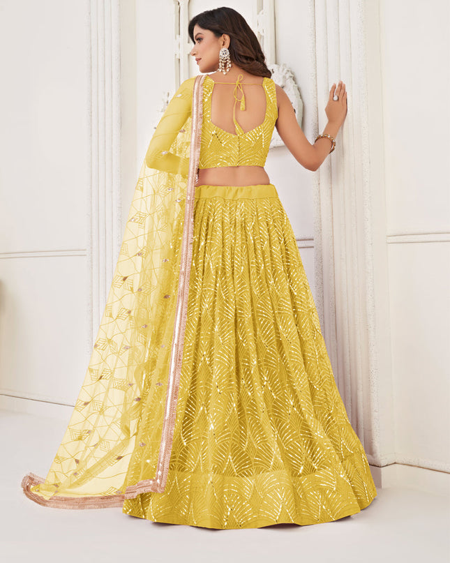 Maize Yellow Net Embroidered Lehenga Choli