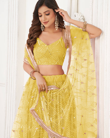 Maize Yellow Net Embroidered Lehenga Choli