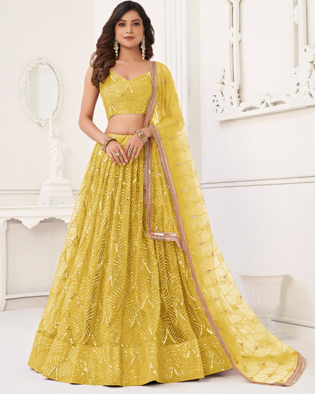 Maize Yellow Net Embroidered Lehenga Choli