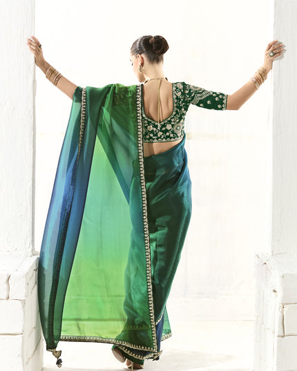 Awesome Emerald Green and Peacock Blue Tissue Embroidered Designer Wedding Saree