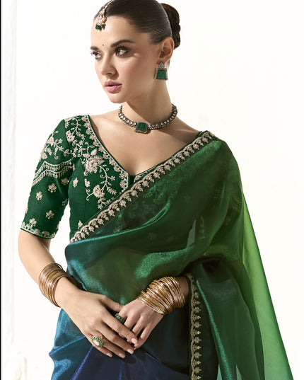 Awesome Emerald Green and Peacock Blue Tissue Embroidered Designer Wedding Saree