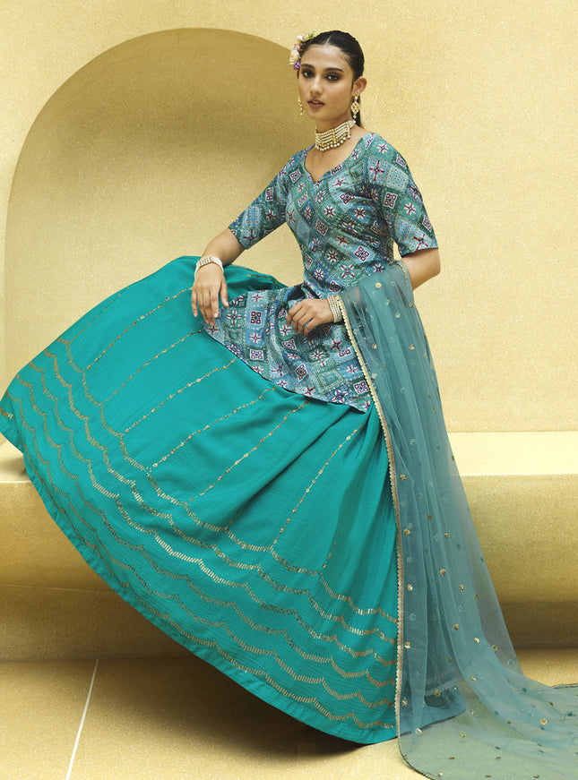 Vibrant Firozi Chinnon Silk Embellished Designer Lehenga Kameez
