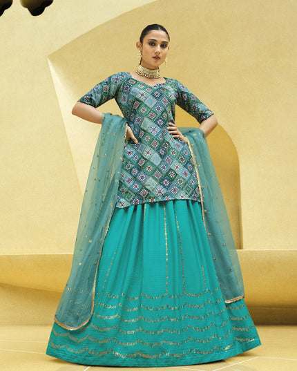 Vibrant Firozi Chinnon Silk Embellished Designer Lehenga Kameez