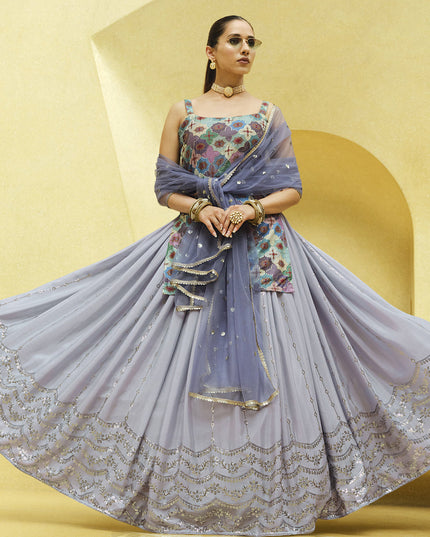 Fabulous Lavender Grey Chinnon Silk Embellished Designer Lehenga Kameez