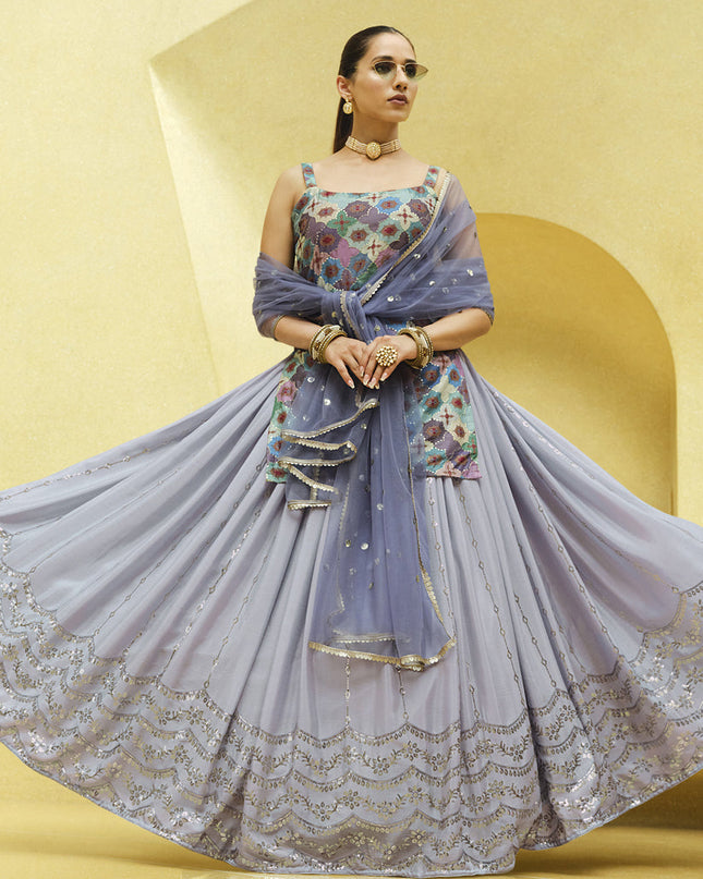 Fabulous Lavender Grey Chinnon Silk Embellished Designer Lehenga Kameez