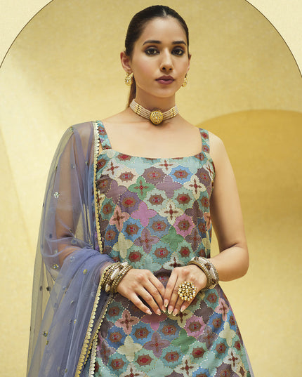 Fabulous Lavender Grey Chinnon Silk Embellished Designer Lehenga Kameez