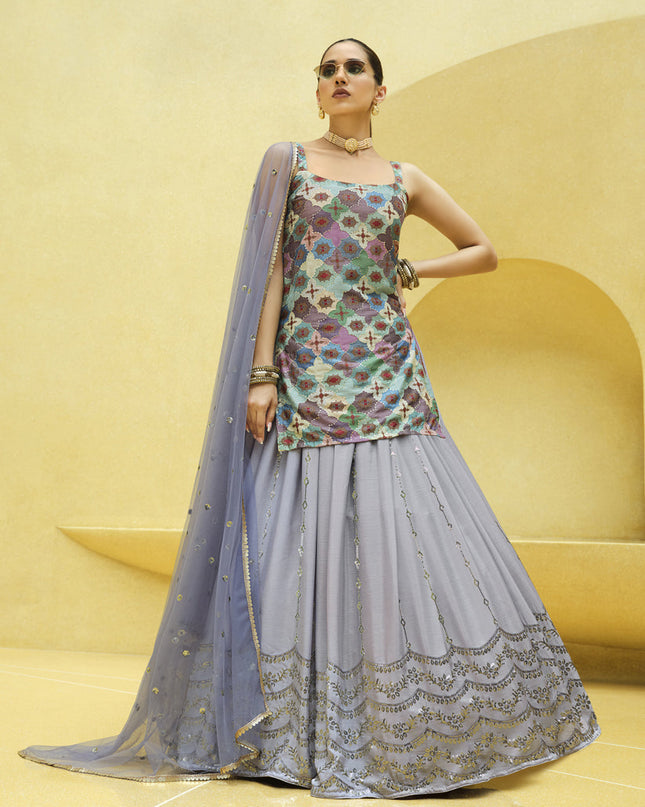 Fabulous Lavender Grey Chinnon Silk Embellished Designer Lehenga Kameez