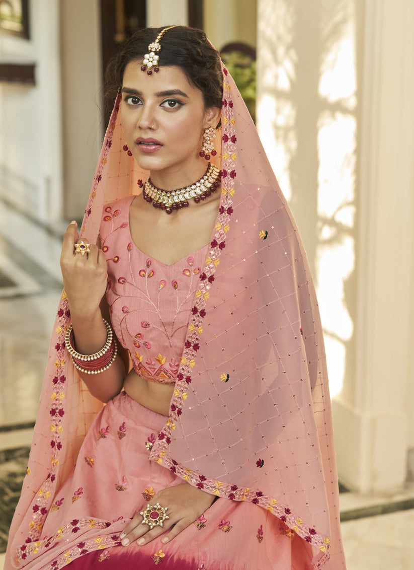 Mesmerizing Strawberry and Peach Art Silk Embroidered Wedding Lehenga Choli