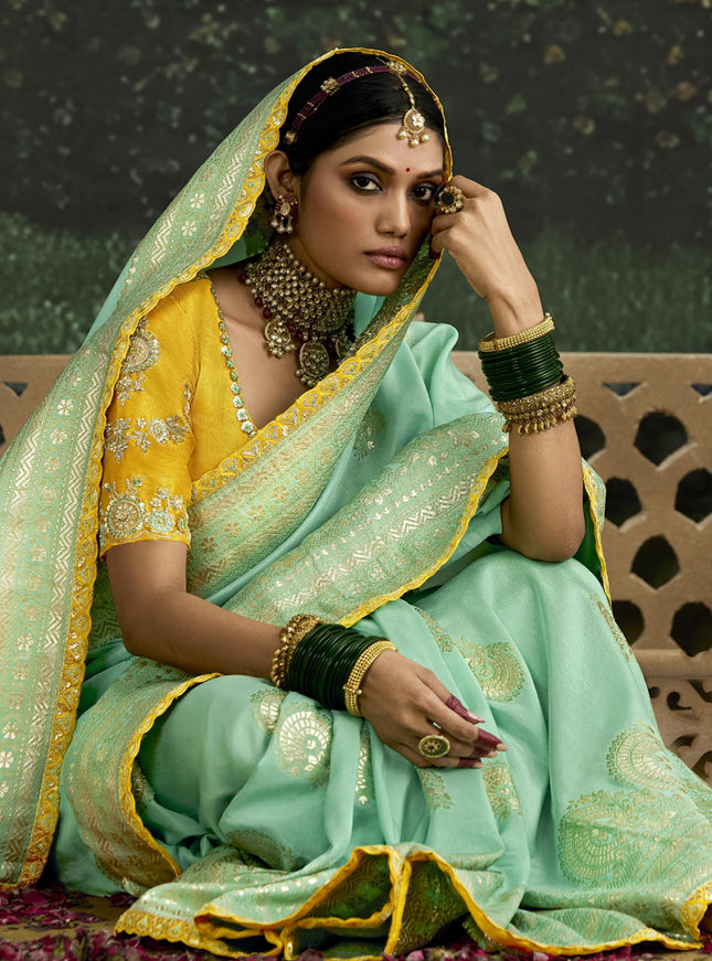 Voguish Turquoise Dola Silk Embroidered Wedding Saree