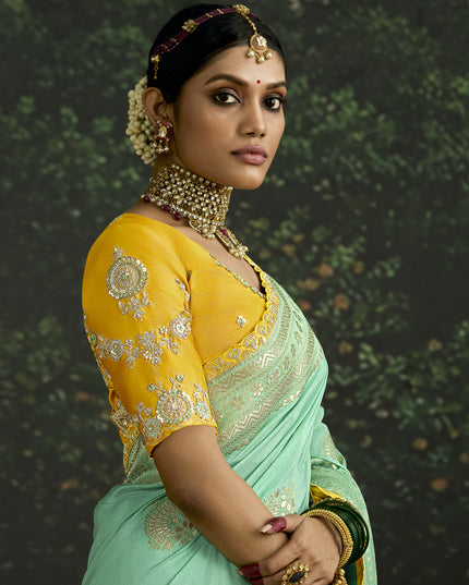 Voguish Turquoise Dola Silk Embroidered Wedding Saree
