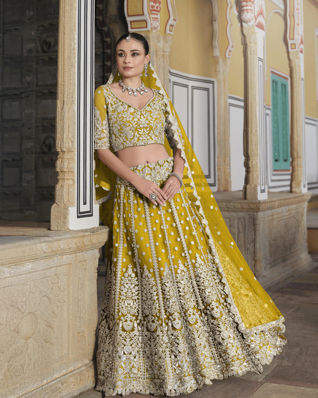 Lemon Yellow Net Embroidered Lehenga Choli