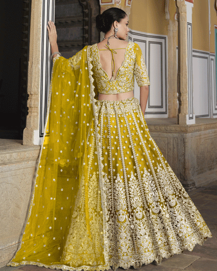 Lemon Yellow Net Embroidered Lehenga Choli