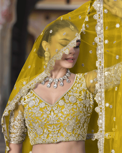 Lemon Yellow Net Embroidered Lehenga Choli