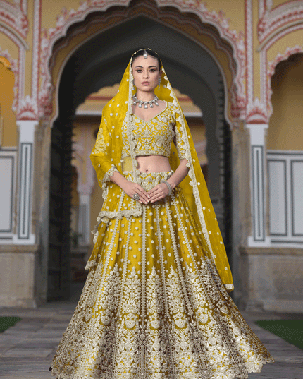 Lemon Yellow Net Embroidered Lehenga Choli