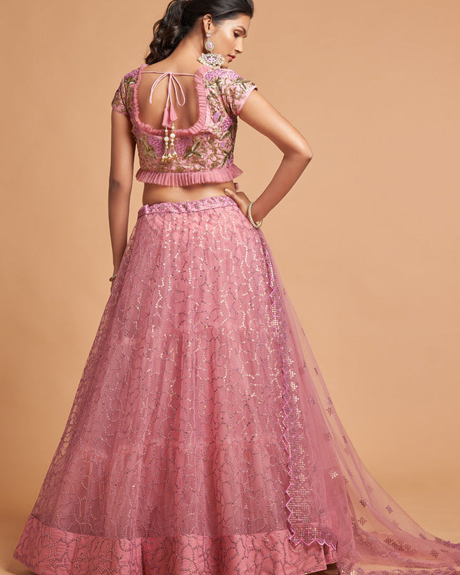 Ravishing Carnation Pink Net Embroidered Designer Lehenga Choli