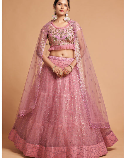 Ravishing Carnation Pink Net Embroidered Designer Lehenga Choli