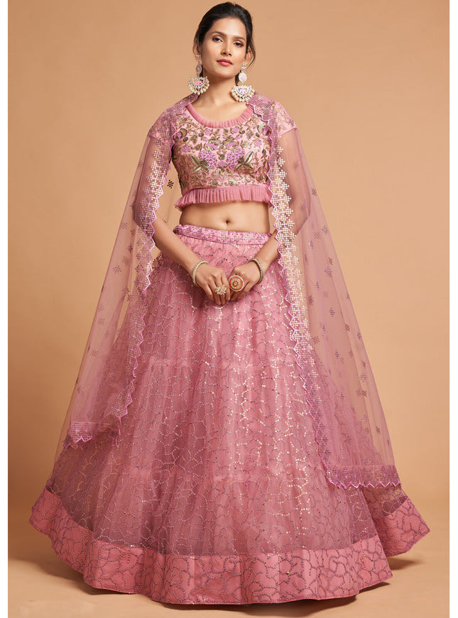 Ravishing Carnation Pink Net Embroidered Designer Lehenga Choli