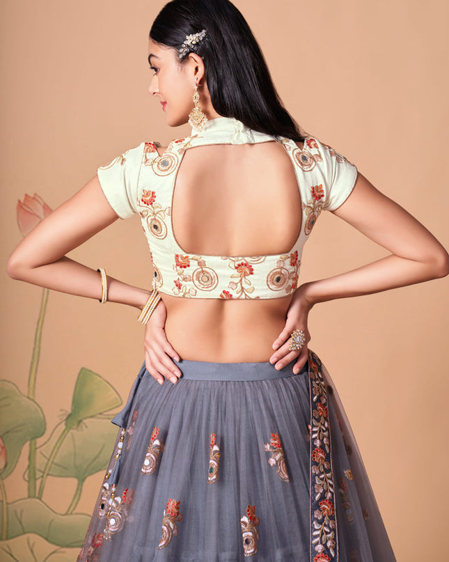 Luxurious Stone Grey Net Embroidered Designer Lehenga Choli