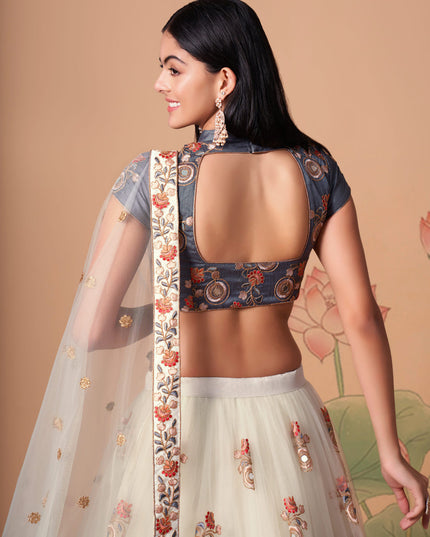 Impeccable Off White Net Embroidered Designer Lehenga Choli