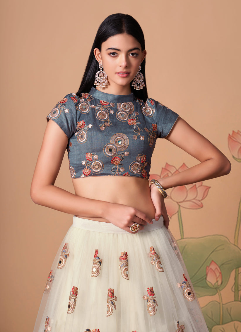Impeccable Off White Net Embroidered Designer Lehenga Choli