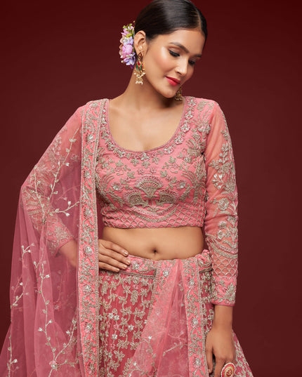 Impeccable Rose Pink Net Embroidered Designer Lehenga Choli