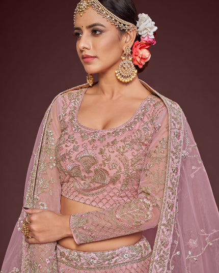 Fascinating Pearl Pink Net Embroidered Designer Lehenga Choli
