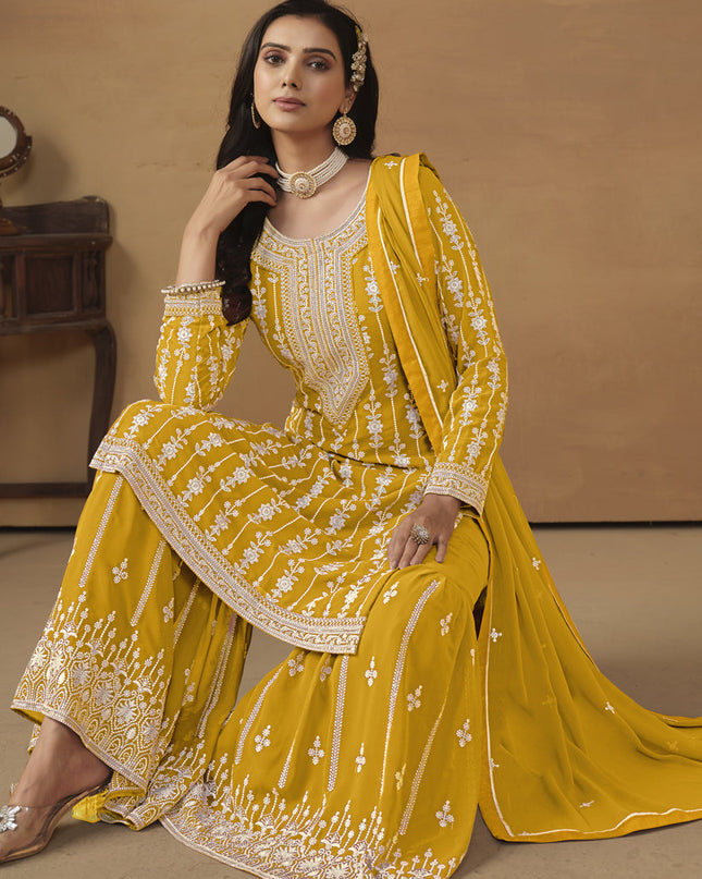 Mustard Faux Georgette Embroidered Sharara Kameez