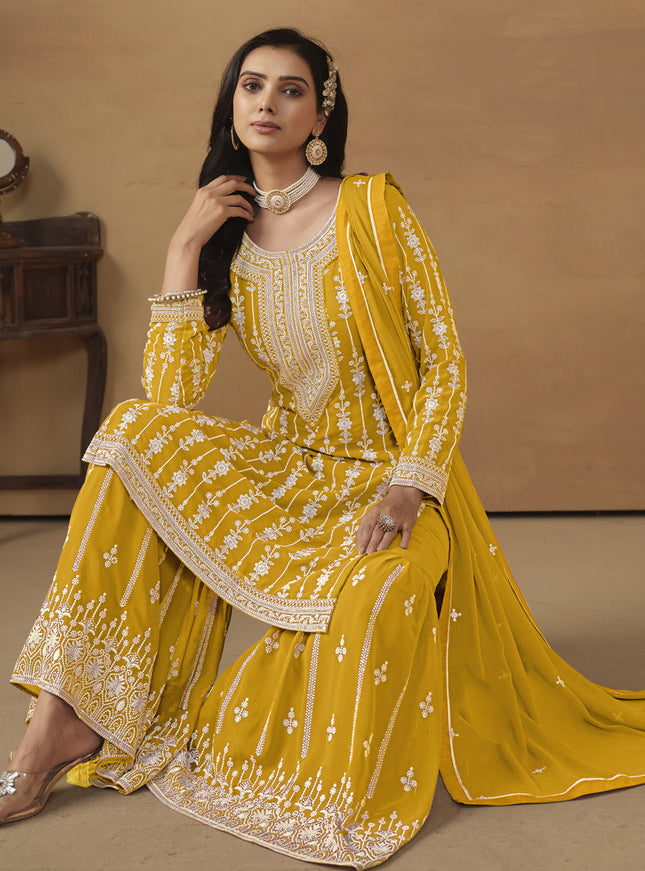 Mustard Faux Georgette Embroidered Sharara Kameez