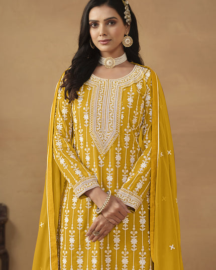Mustard Faux Georgette Embroidered Sharara Kameez