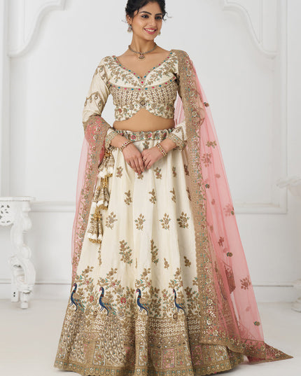 Fascinating Off White Heavy Embroidered Silk Bridesmaid Lehenga Choli