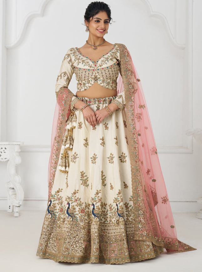 Fascinating Off White Heavy Embroidered Silk Bridesmaid Lehenga Choli
