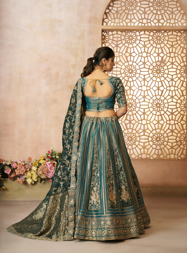 Glamorous Green Tissue Silk Wedding Wear Lehenga Choli
